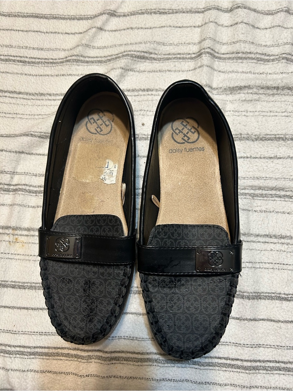 Daisy Fuentes Black Women's Slip-On Moccasins with Logo Plaque